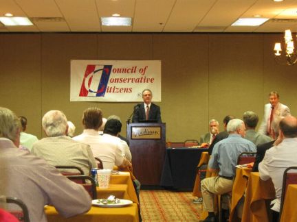 Jared Taylor, founder of American Renaissance, speaking at the CofCC conference.  Taylor is a public advocate of white nationalism and race and IQ claims.
