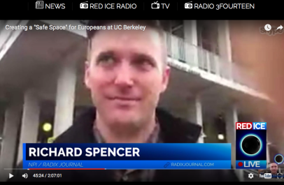 Richard Spencer talking into the camera to the Red Ice Creations hosts.